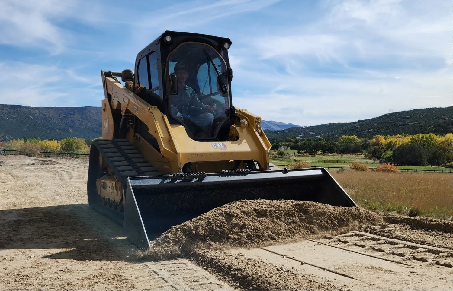 Caterpillar Track Skid Steer Loader with Bucket Attachment